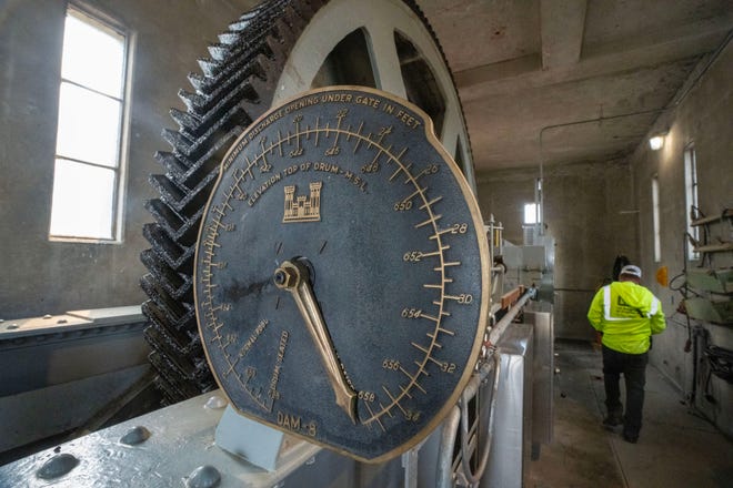 Gearing installed in the mid-1930s that controls a roller gate   is shown Wednesday, May 17, 2023 at Lock and Dam #8 in Genoa, Wis.  The locks allow the boats to gradually adjust to changing river levels. Most towboats can push 15 barges at a time on the river. When those barges reach a 600-foot long lock, they don’t fit. Instead, they have to be split up, which takes more than twice as long.It was constructed and was put into operation by April 1937.