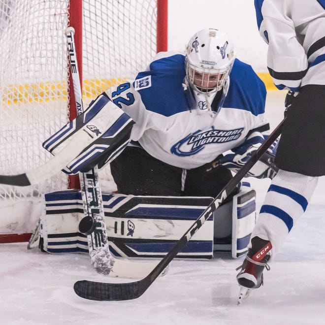 Lakeshore Lightning goalie Elizabeth Bowers (42) blocks a shot during the game against Arrowhead at the Ozaukee Ice Center in Mequon on Wednesday, Nov. 29, 2023.