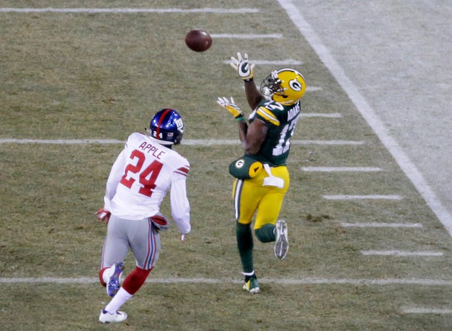 Green Bay Packers wide receiver Davante Adams (17) hauls in a long pass during the 2nd quarter of the Green Bay Packers wild-card playoff game against the New York Giants at Lambeau Field in Green Bay, Wis. on January 8, 2017. The Packers won 38-13.