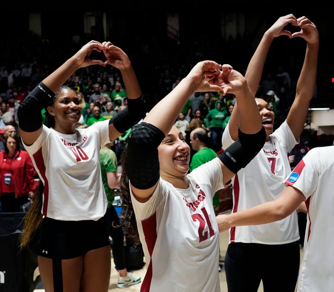 Wisconsin celebrates their victory over Penn State in the NCAA Regional Volleyball semifinal match on Thursday December 7, 2023 at the UW Field House in Madison, Wis.